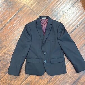 Boys size 7 black blazer.   Barely worn.